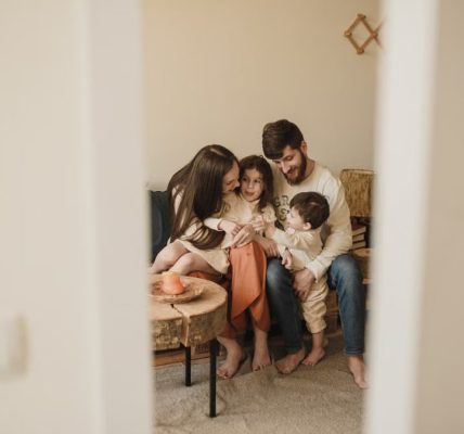 A loving family enjoying a warm, intimate moment together indoors.